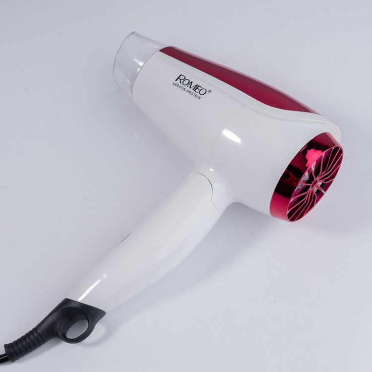 سشوار مسافرتی 1800 وات رومئو مدل RM-5959، موتور AC، وزن 350 گرم، المنت فلز، دارای سری متمرکز کننده پهن با ویژگی صاف ک...