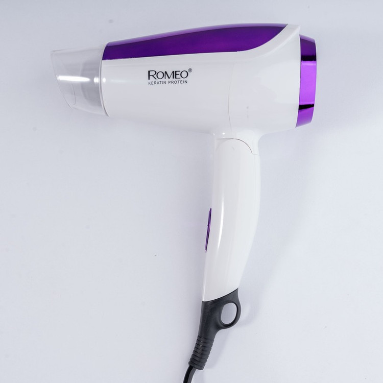 سشوار مسافرتی 1800 وات رومئو مدل RM-5959، موتور AC، وزن 350 گرم، المنت فلز، دارای سری متمرکز کننده پهن با ویژگی صاف ک...